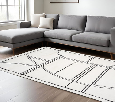 4' X 6' Ivory And Black Geometric Area Rug